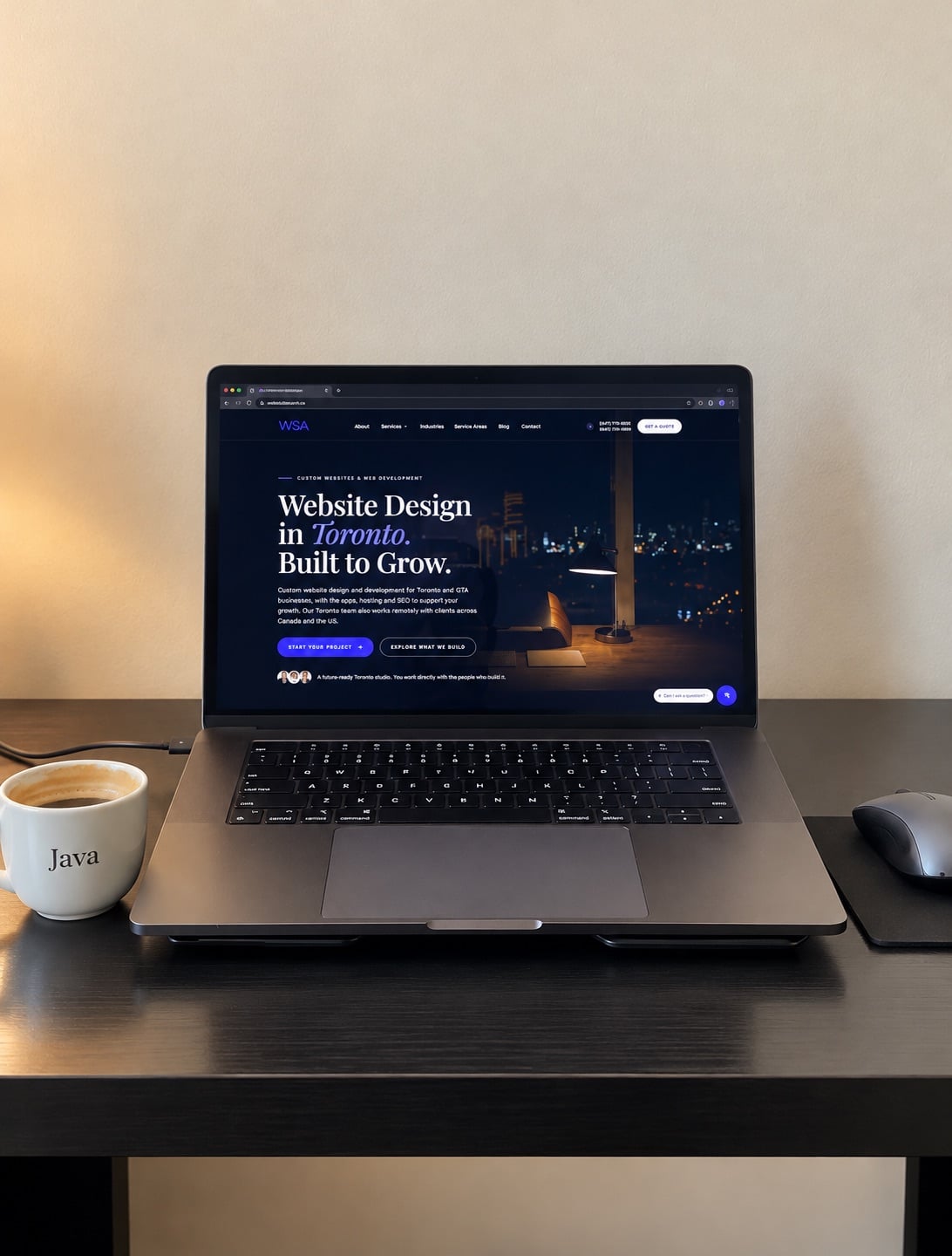 The WebSolArch homepage open on a laptop on a dark wooden desk